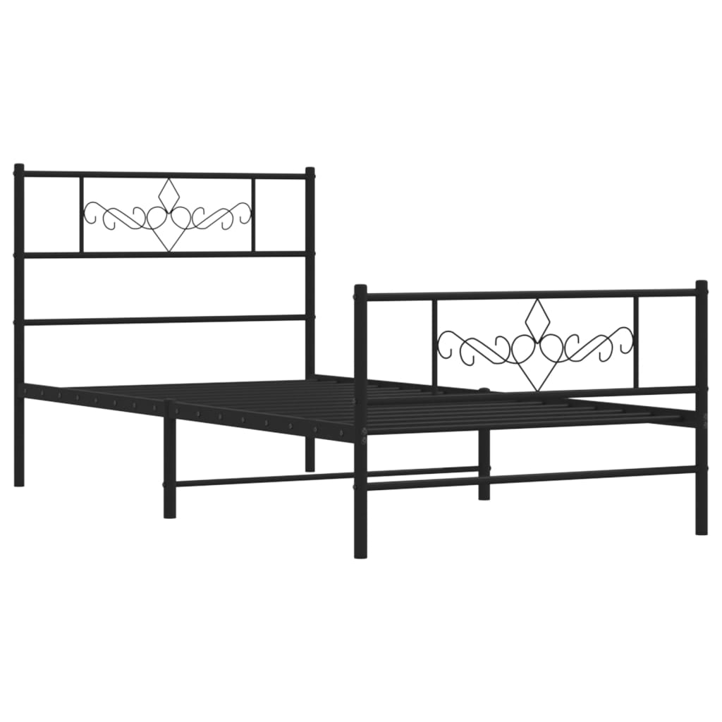 Black metal twin bed frame with ornate scrollwork on headboard and footboard