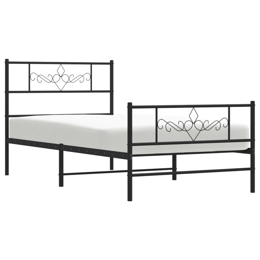 Black metal bed frame with ornate scrollwork headboard