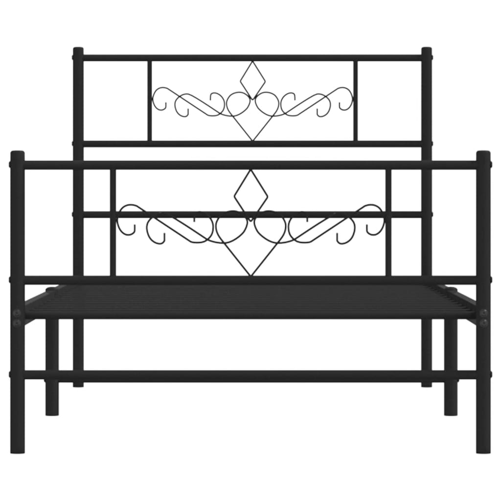 Ornate black metal full bed frame with decorative headboard and footboard