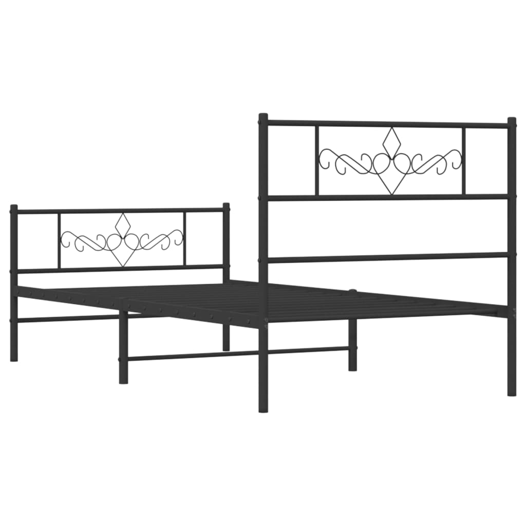 Black metal platform bed frame with ornate scrollwork headboard