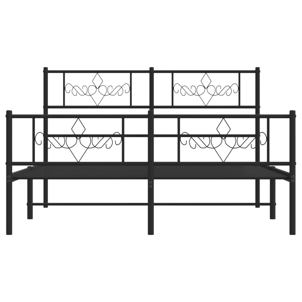 Antique bronze metal bed frame with decorative headboard and patterned bedding