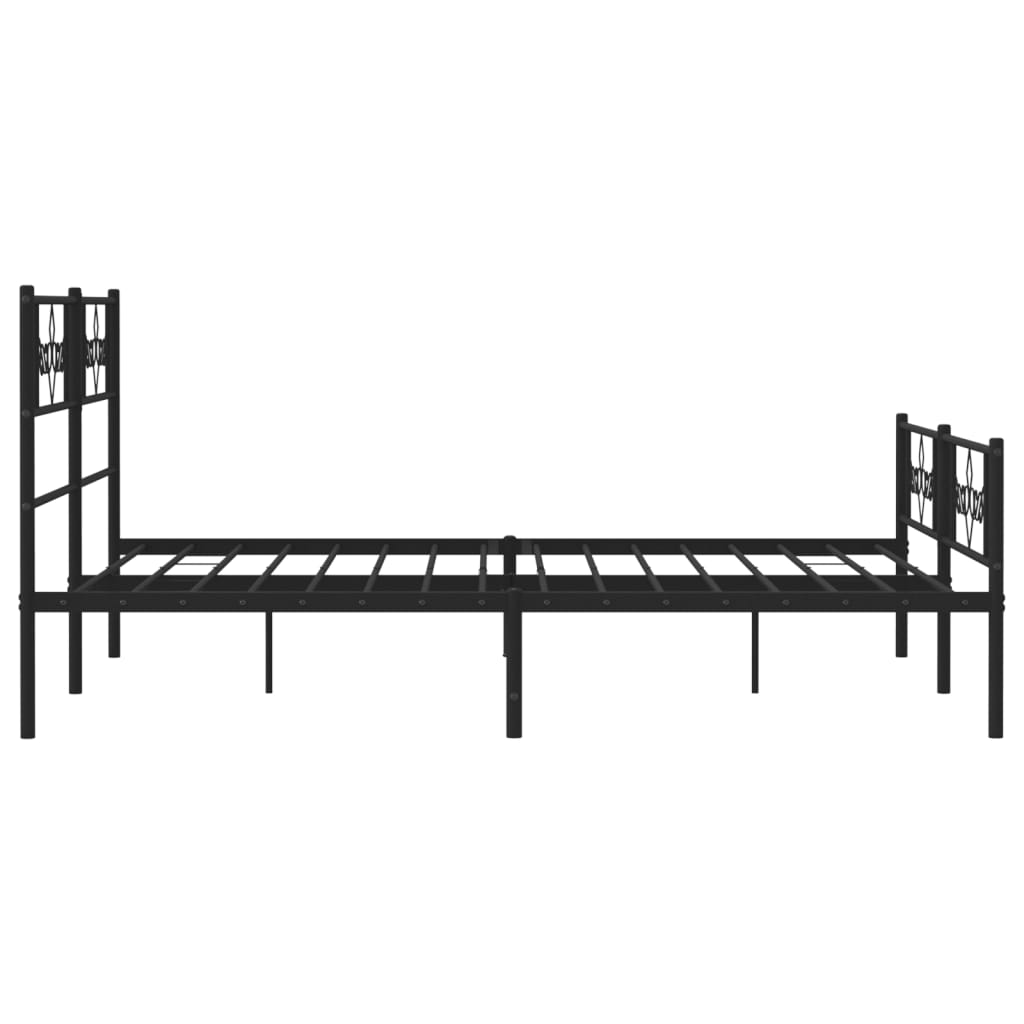 Black metal bed frame with ornate scrollwork on headboard and footboard
