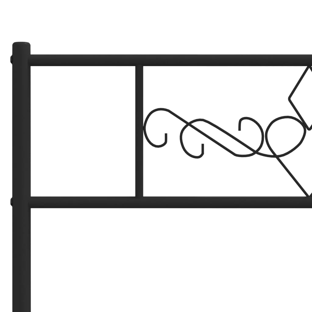 Black metal twin bed frame with decorative headboard and footboard