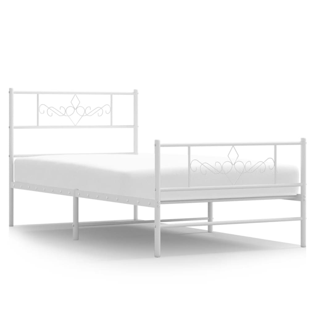 White metal bed frame with decorative headboard and footboard