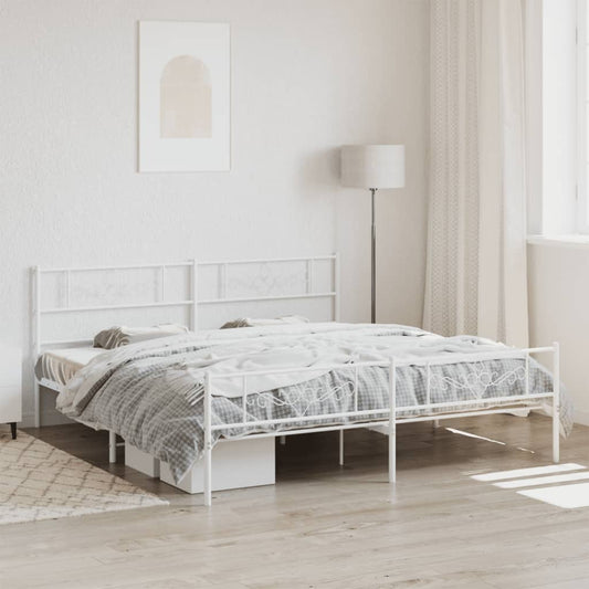 White metal twin bed frame with ornate headboard and footboard