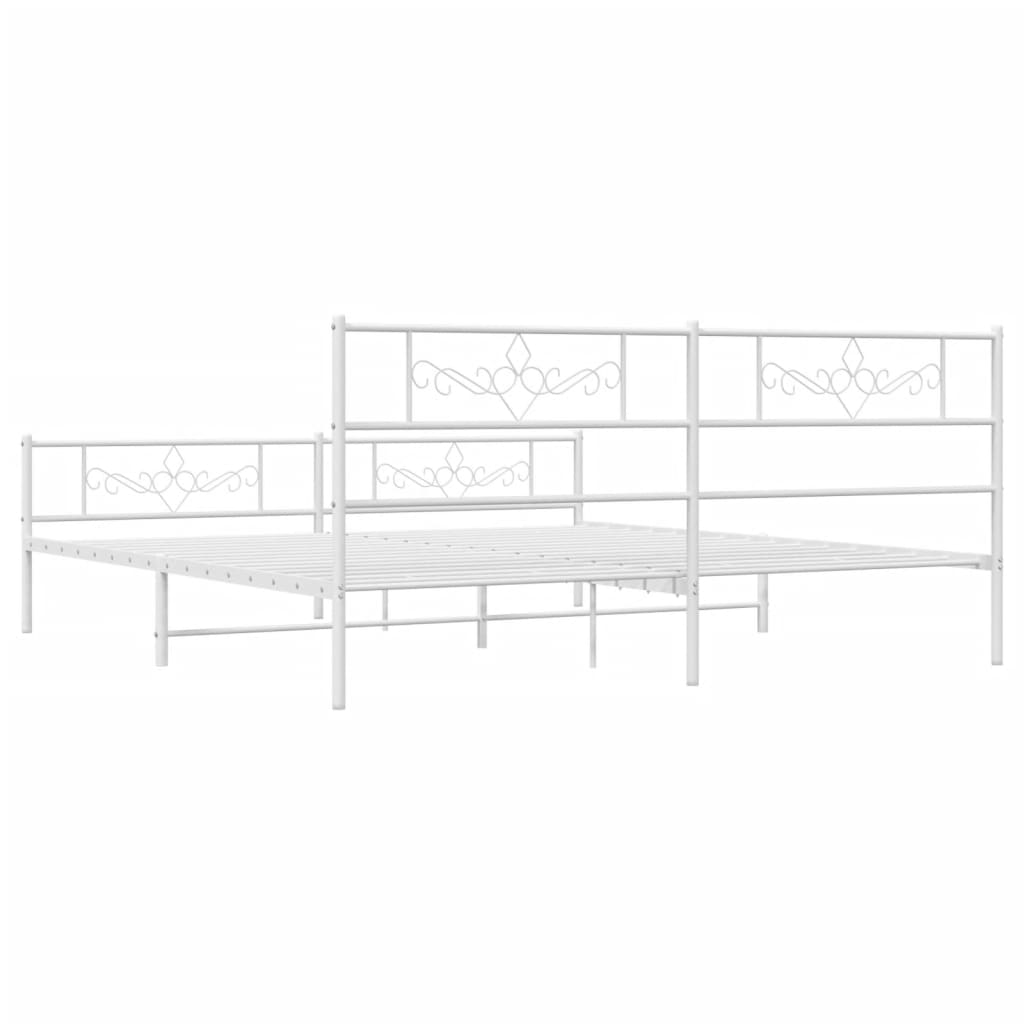 White metal bed frame with ornate scrollwork detailing