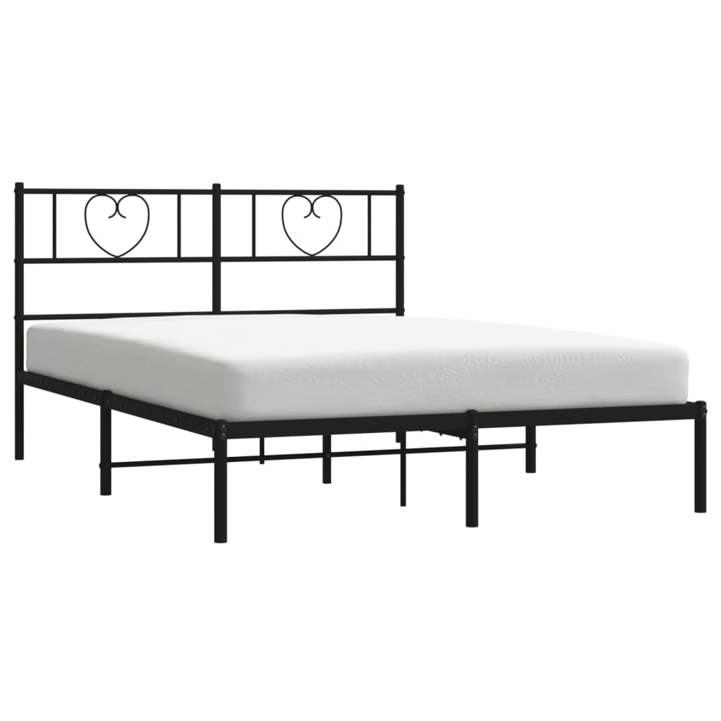 Black metal bed frame with heartshaped headboard detail