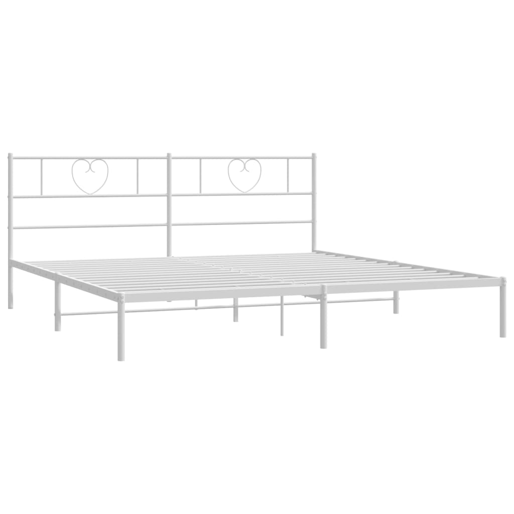 White metal queen bed frame with heartshaped headboard detailing