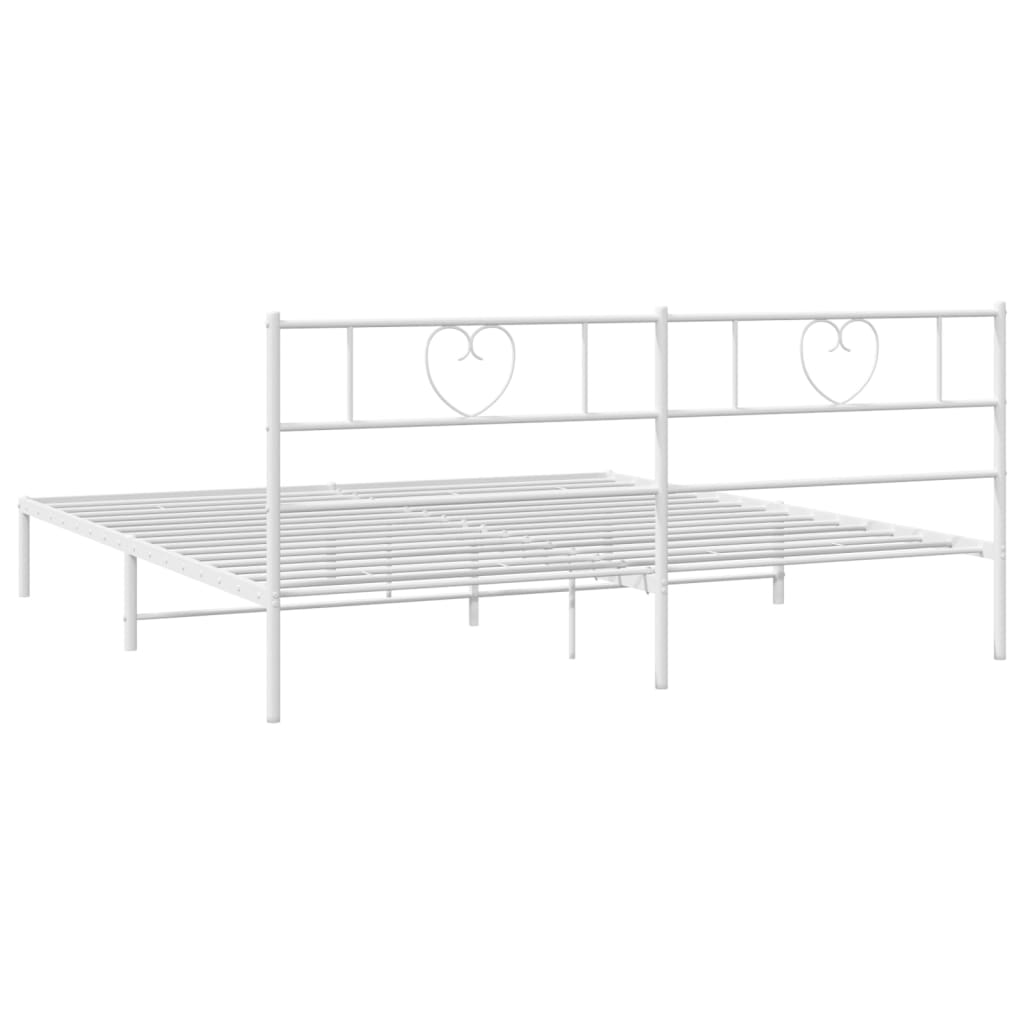 White metal bed frame with heartshaped headboard details