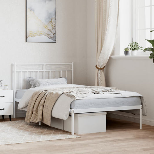 White metal single bed frame with ornate headboard