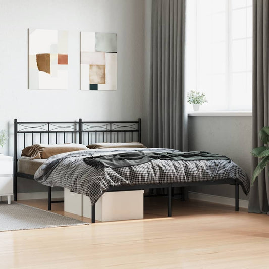 Black metal bed frame with a geometric headboard and upholstered mattress