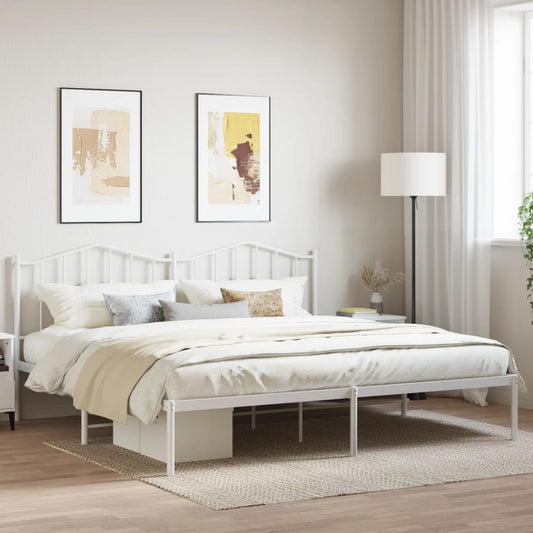 White metal bed frame with ornate headboard and footboard