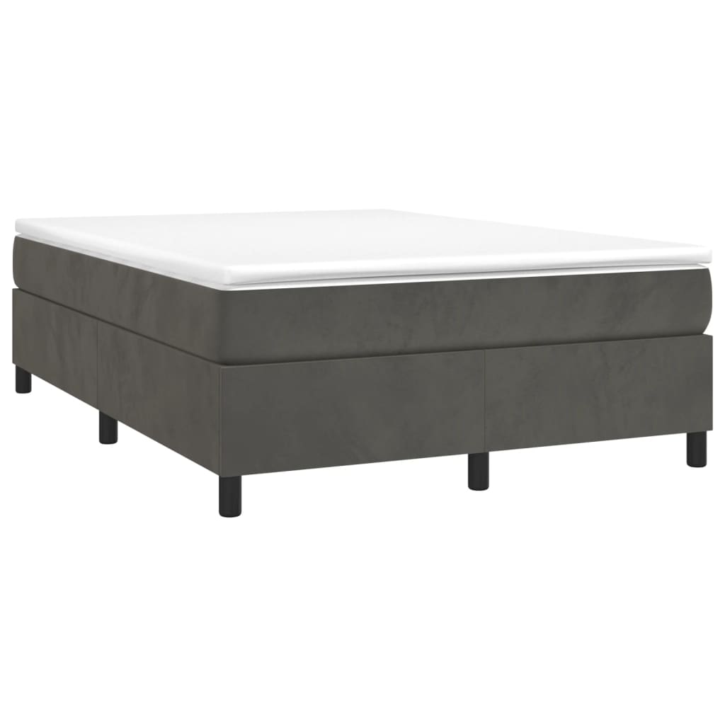 Dark grey upholstered bed frame with white mattress