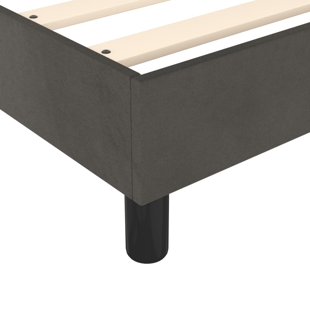 Dark grey upholstered bed frame with wooden slats and black legs