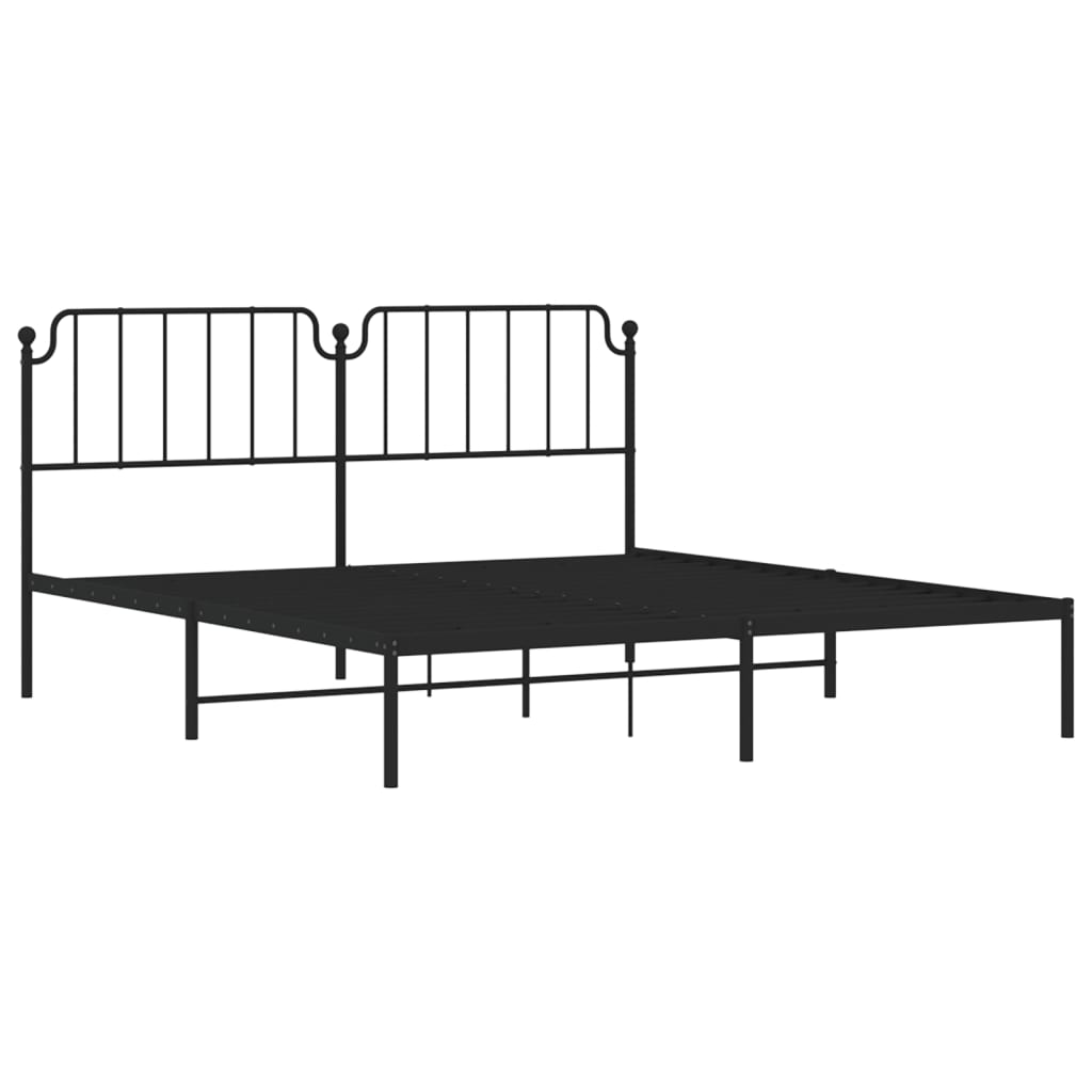 Black metal frame bed with ornate headboard and footboard king size