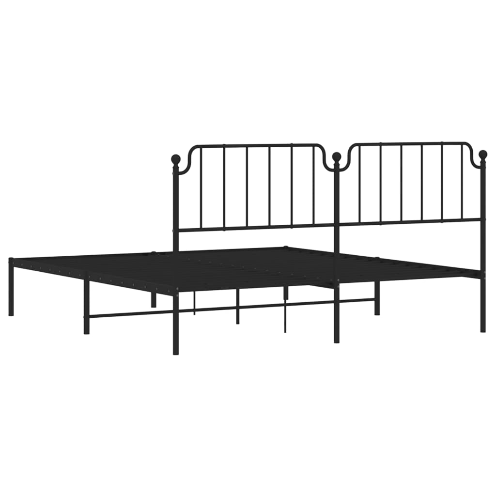 Black metal bed frame with ornate headboard