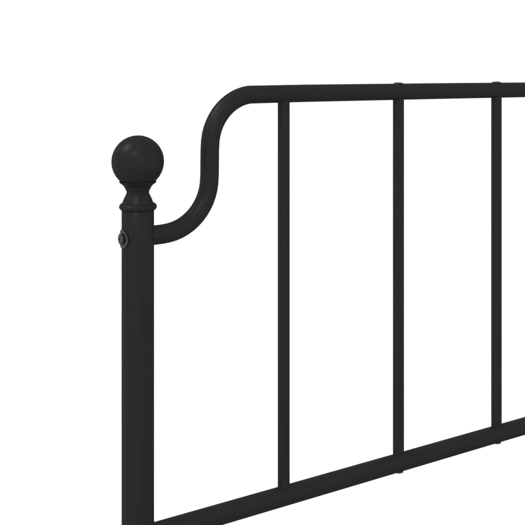 Black metal twin bed frame with ornate headboard and footboard
