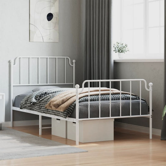 White metal bed frame with ornate headboard and footboard