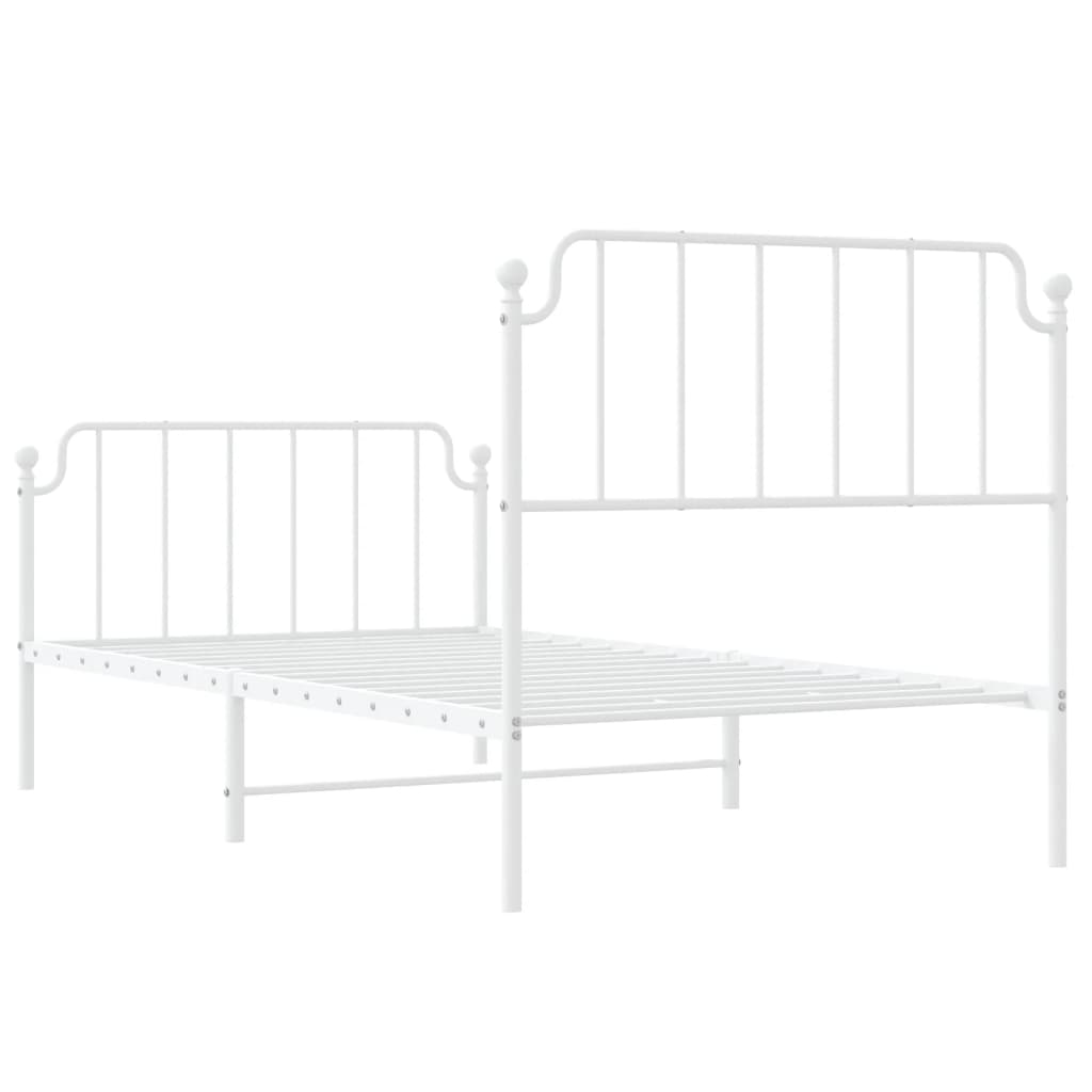 White metal twin bed frame with ornate headboard and footboard
