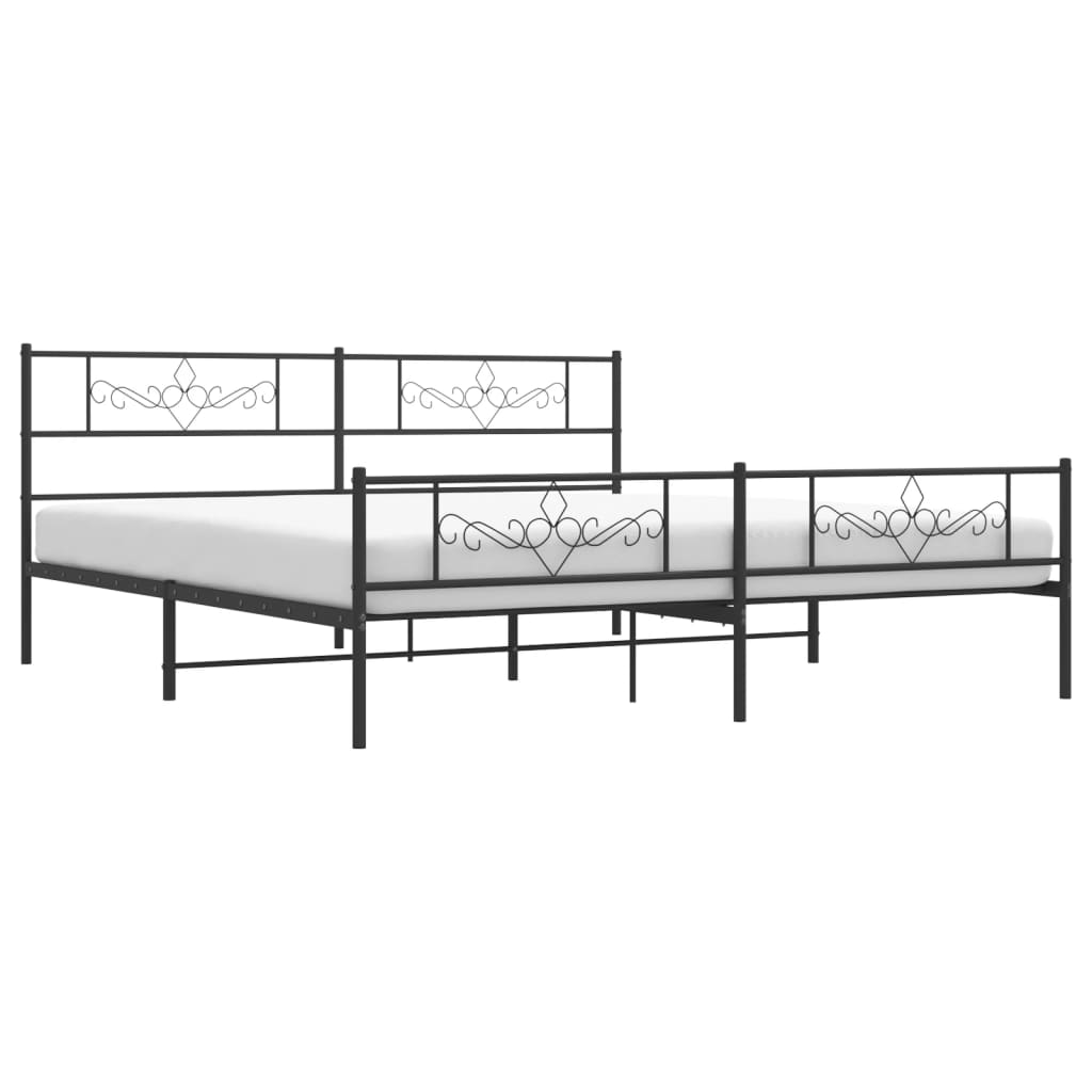 Black metal bed frame with ornate scrollwork on the headboard and footboard