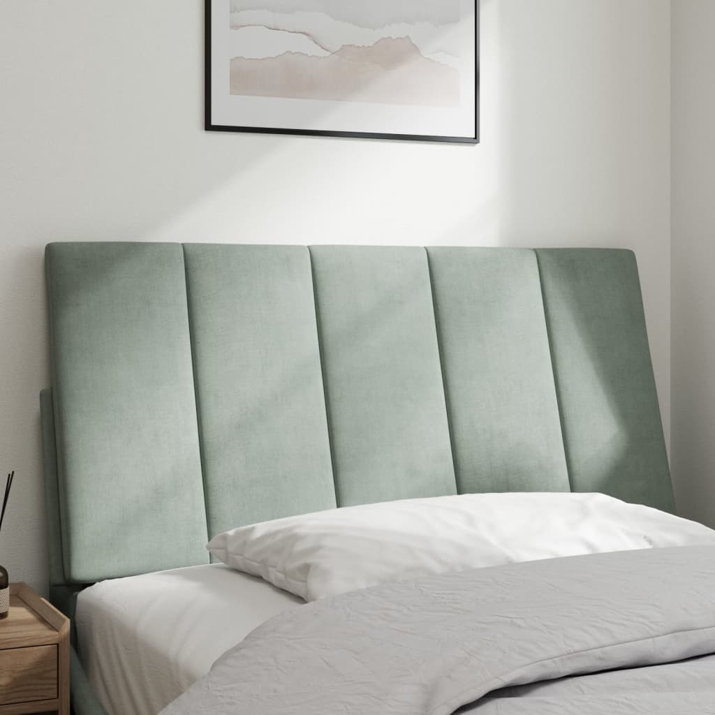 Light grey upholstered headboard with five vertical panels