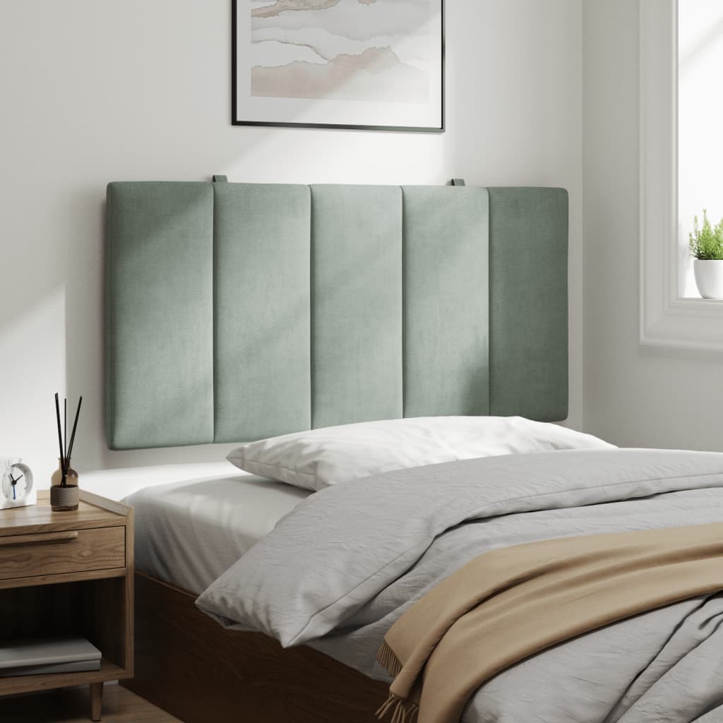 Soft sage green velvet upholstered headboard with vertical channel tufting