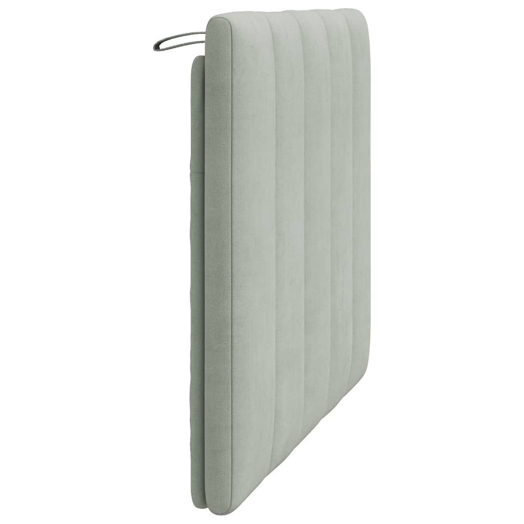 Soft grey upholstered headboard with five vertical tufted panels