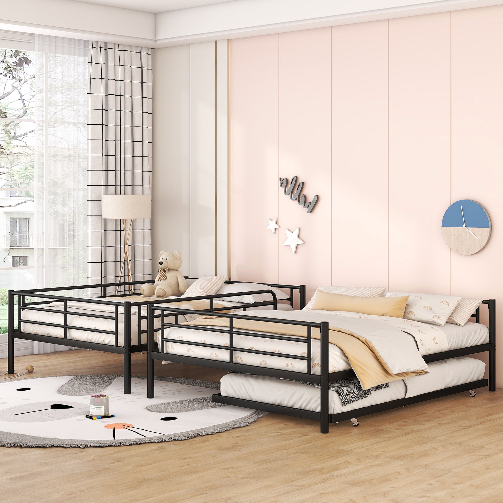 Black metal triple bunk bed with rainbow patterned bedding