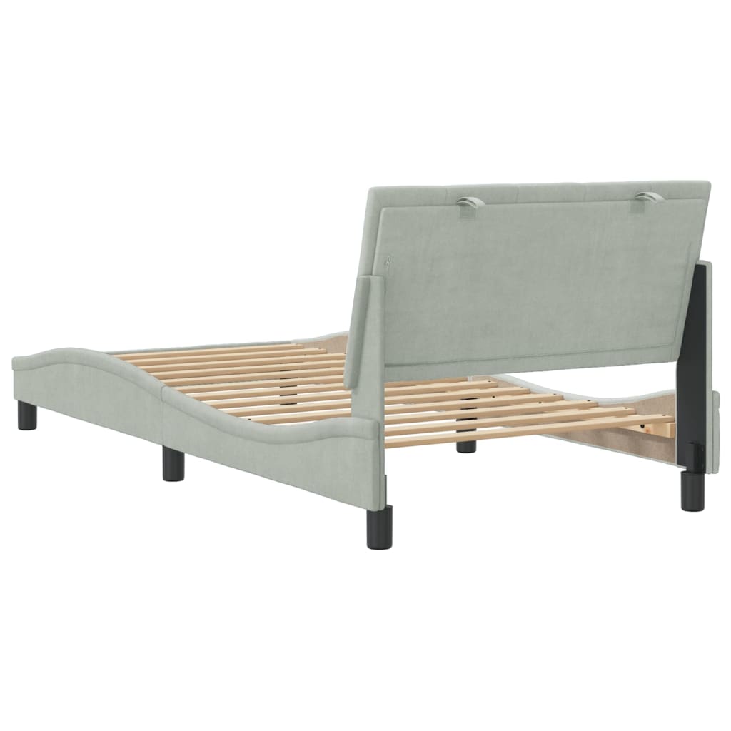 Light green velvet bed frame with adjustable headboard and wooden slats