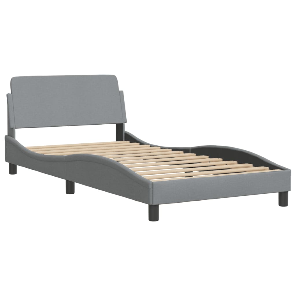 Gray fabric upholstered twin bed frame with curved headboard