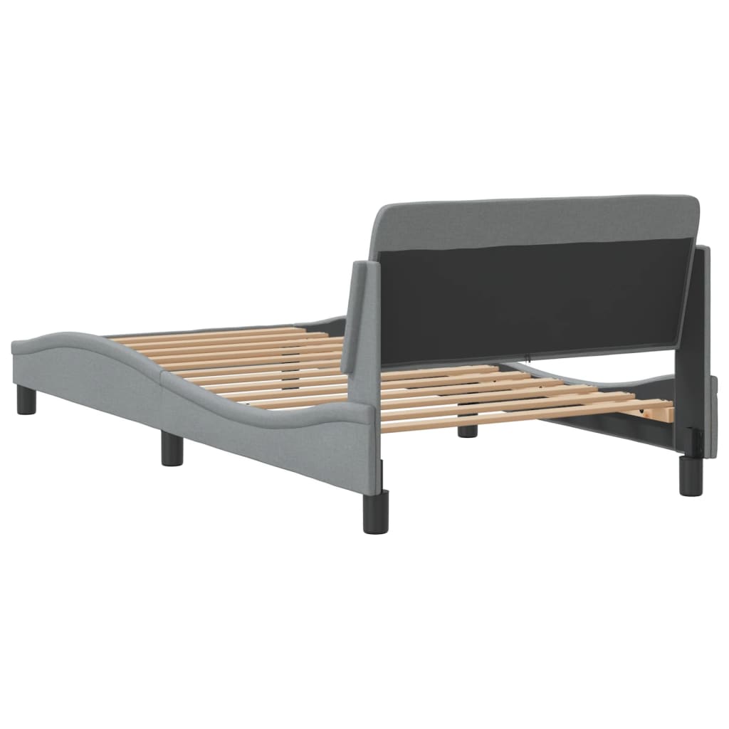 Modern grey fabric bed frame with curved silhouette