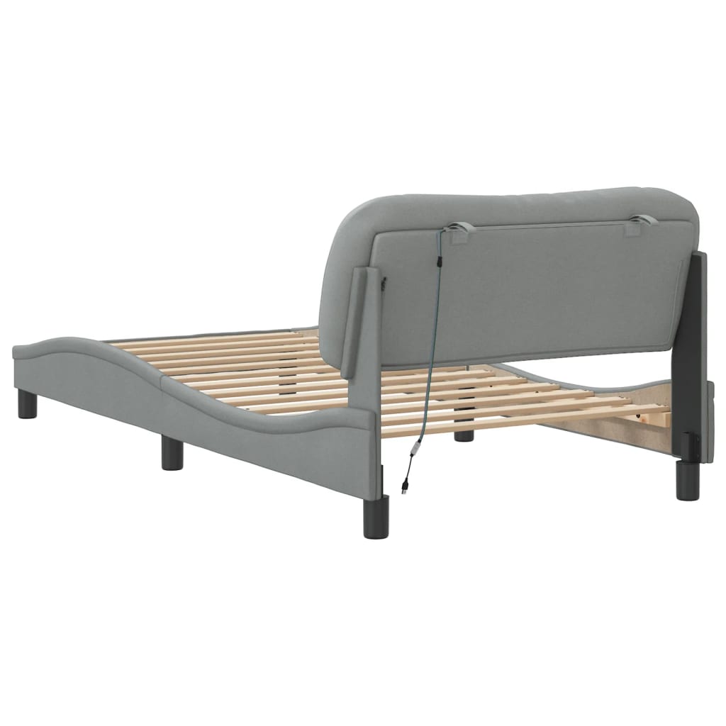 Grey fabric upholstered bed frame with adjustable headrest and wooden slats