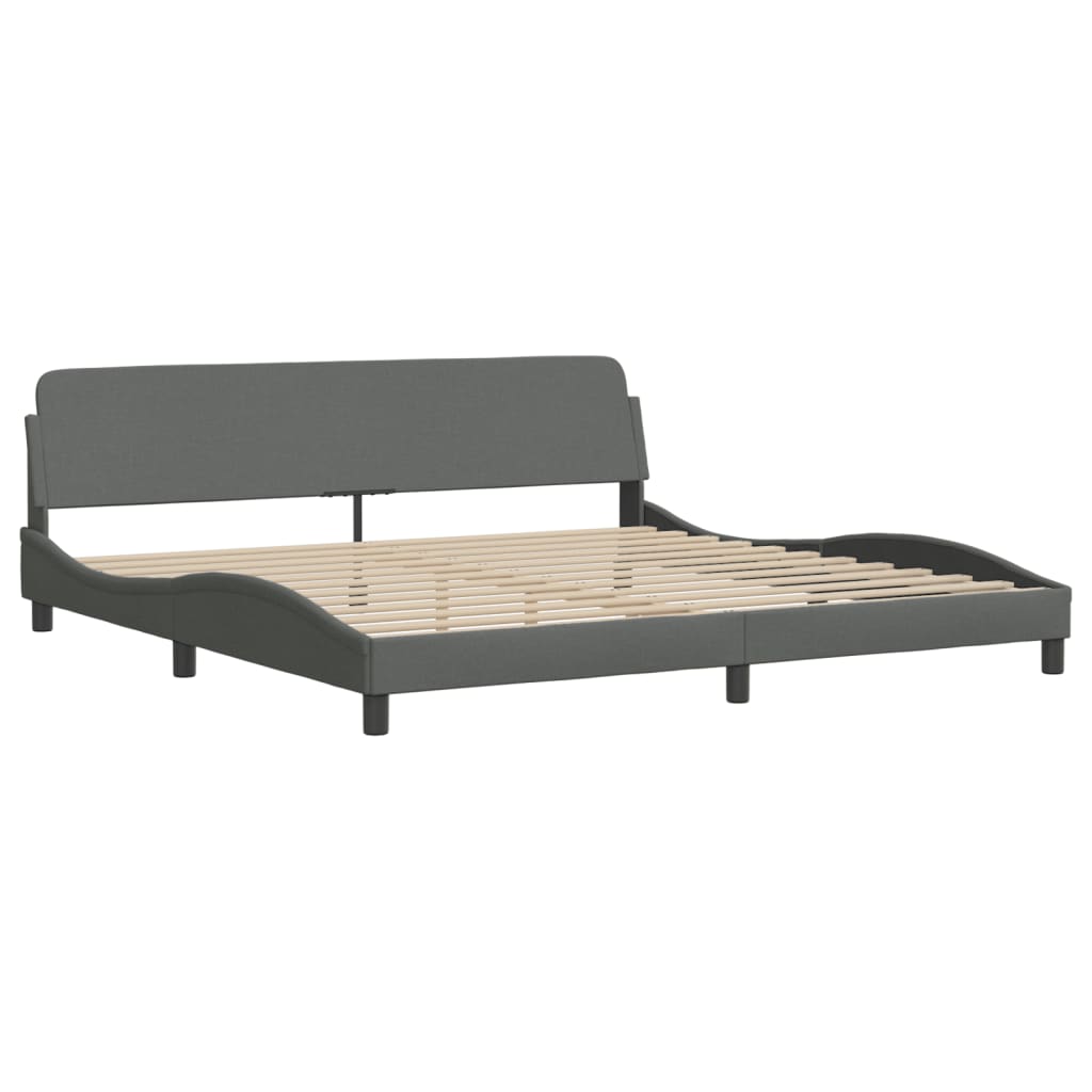 Modern gray upholstered bed frame with a curved headboard