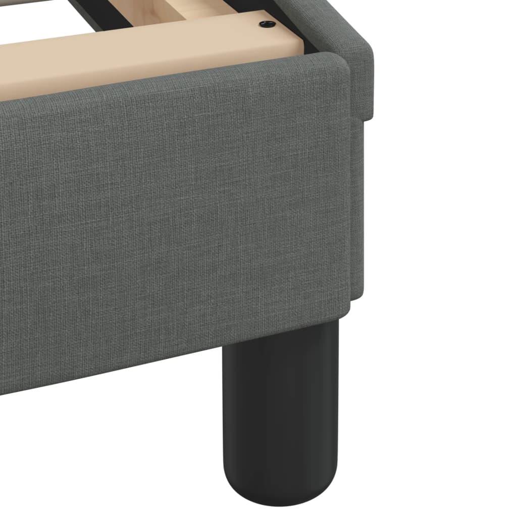 Grey upholstered queen bed frame with wooden slats