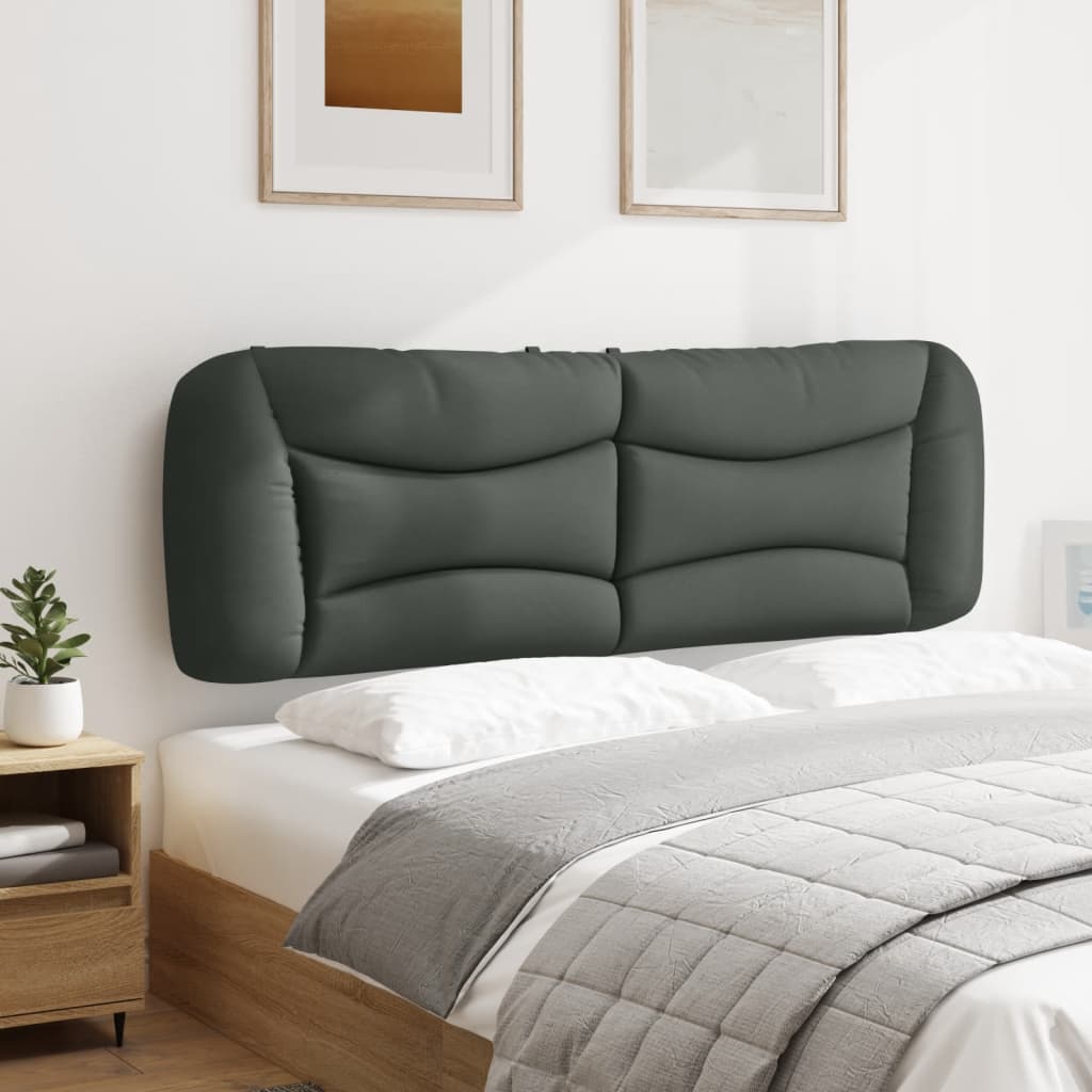 Dark grey upholstered headboard with quilted pattern for a modern bedroom