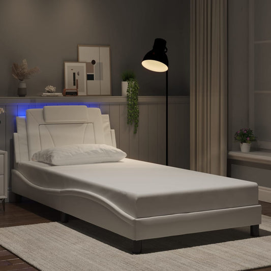 Modern white faux leather chaise lounge with builtin LED headboard