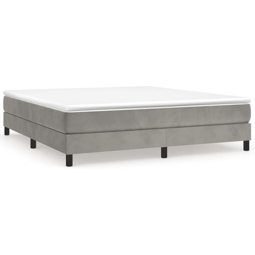 White wooden bed frame with slatted base and dimensions labeled