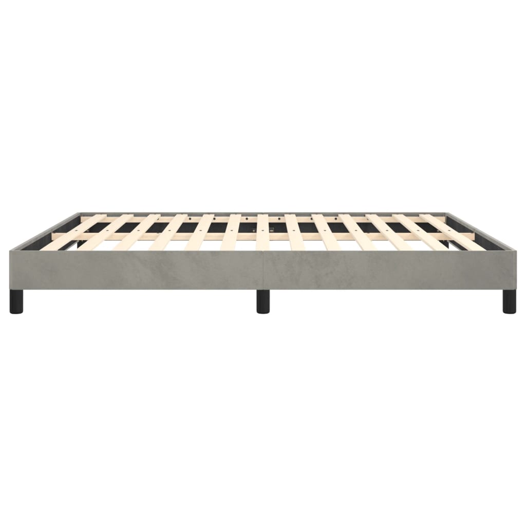 Grey upholstered queen bed frame with wooden slats and black legs