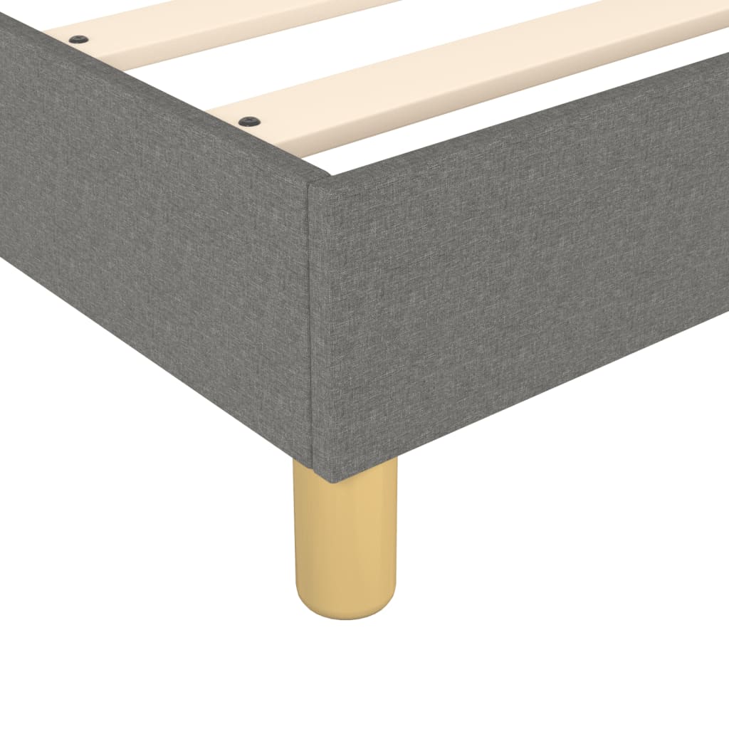 Grey fabric platform bed frame with wooden slats