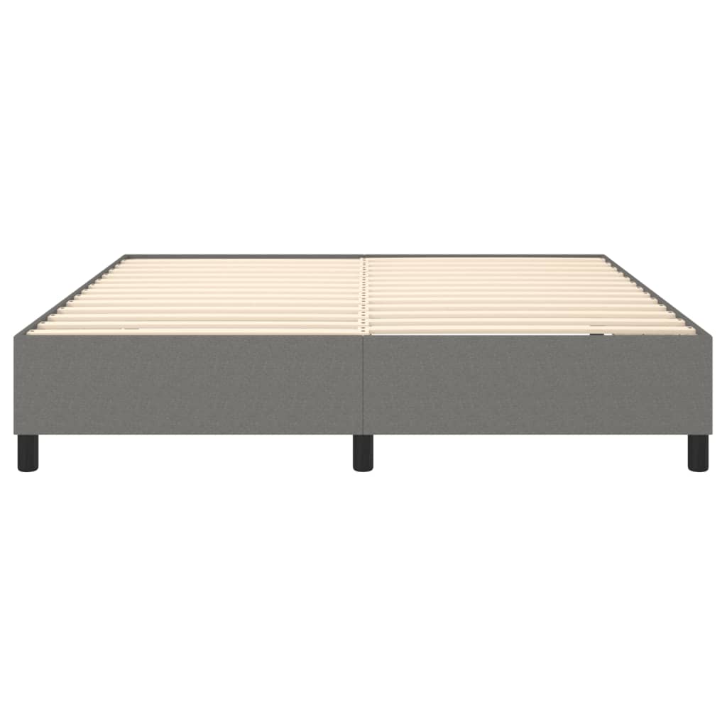Grey upholstered bed frame with wooden slats and black legs