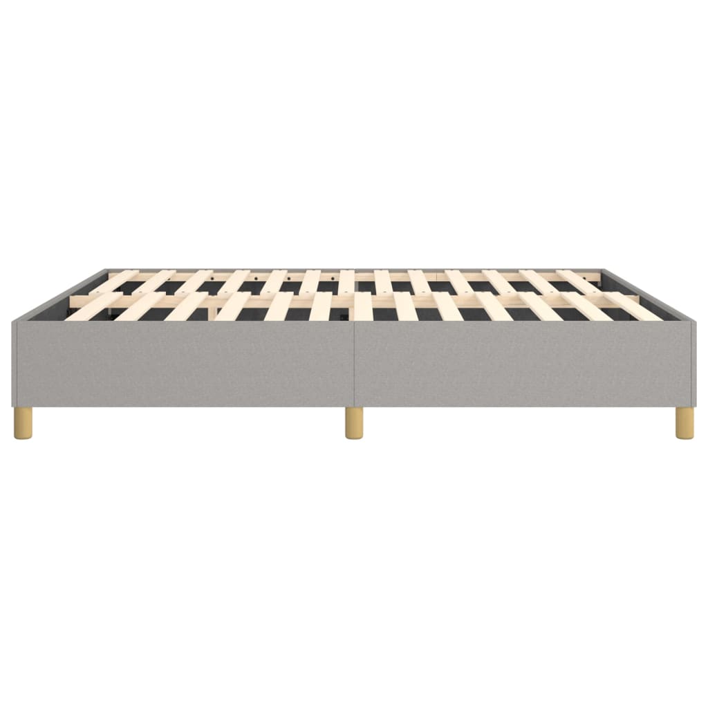 Grey fabric upholstered bed frame with wooden slats