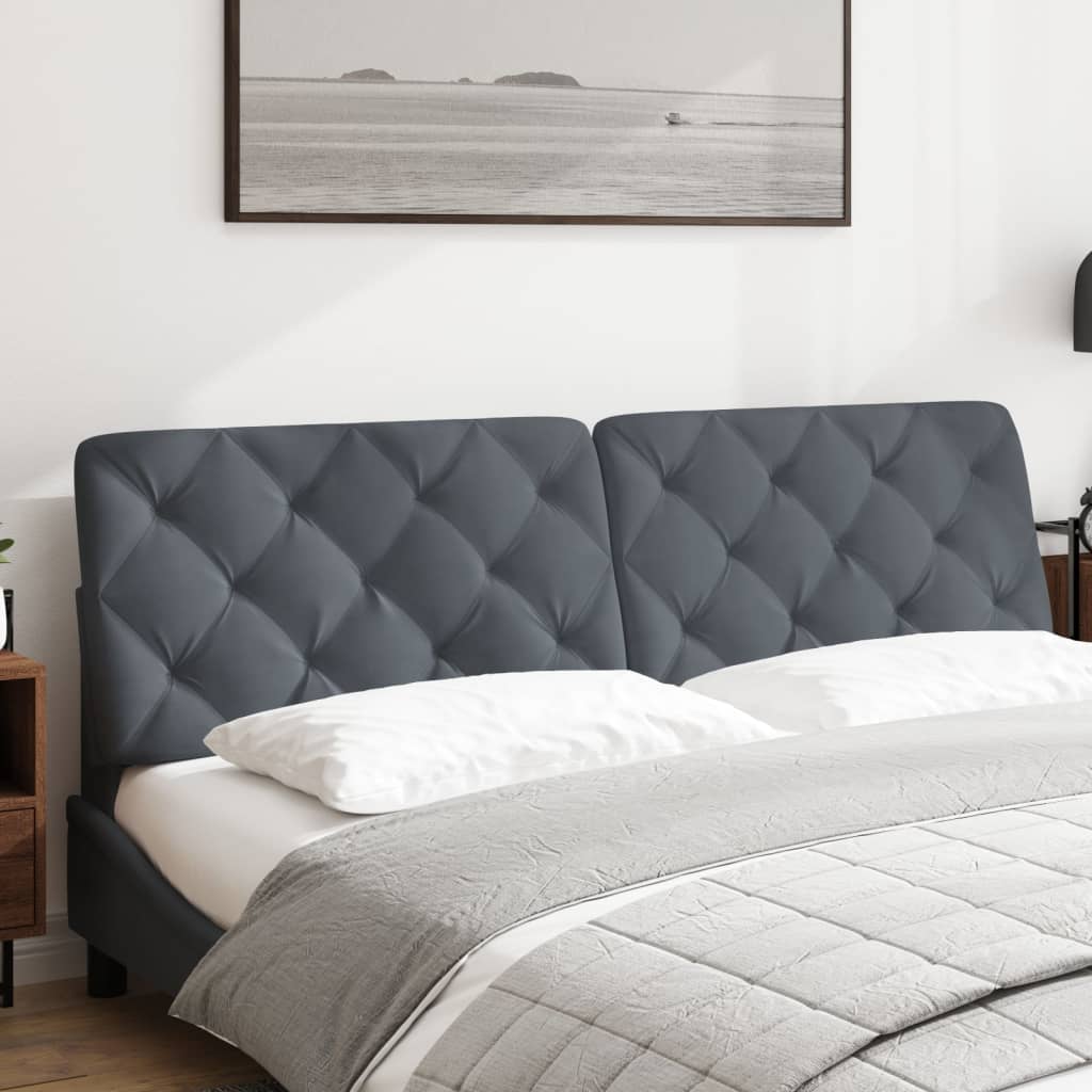 Two gray upholstered headboard panels with diamond tufting