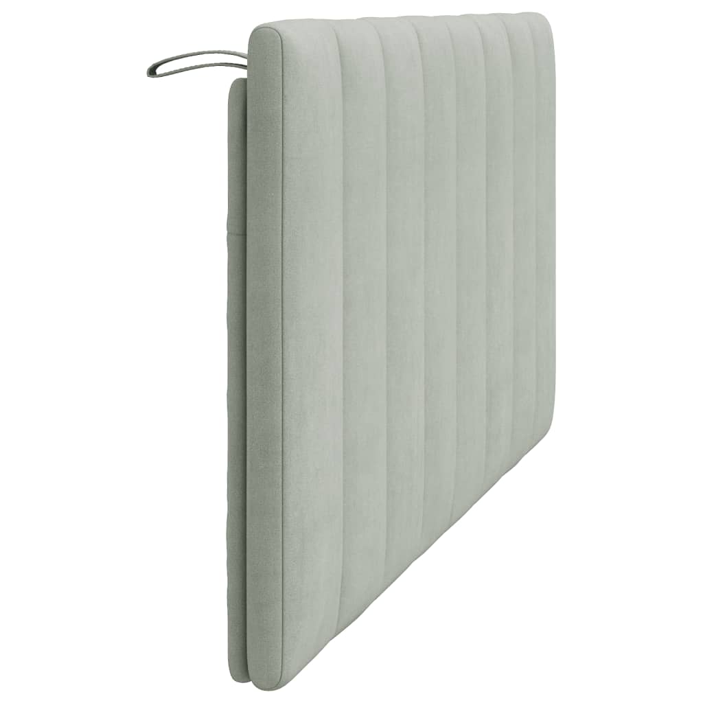 Light grey upholstered headboard with vertical paneling