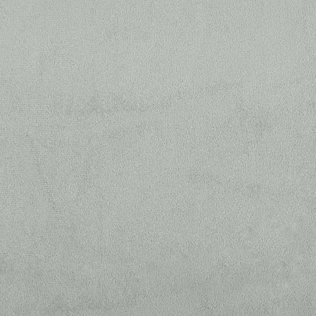 Light grey velvet padded headboard with vertical tufting