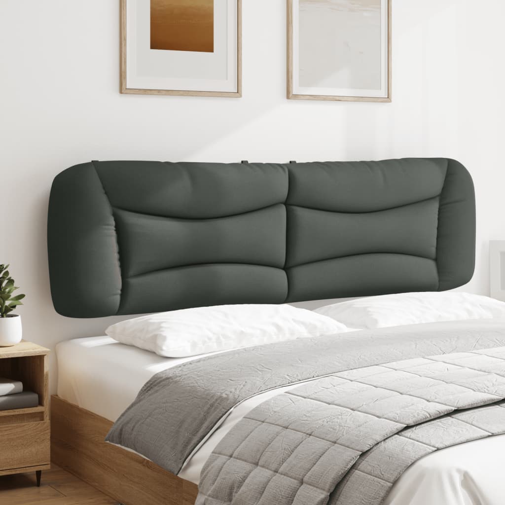 Padded grey headboard with curved stitching detail