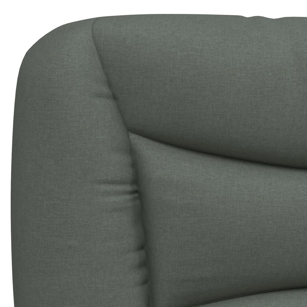 Dark gray upholstered headboard with builtin storage pockets