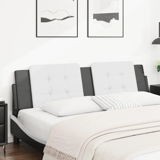 Black and white tufted convertible sofa bed with white bedding