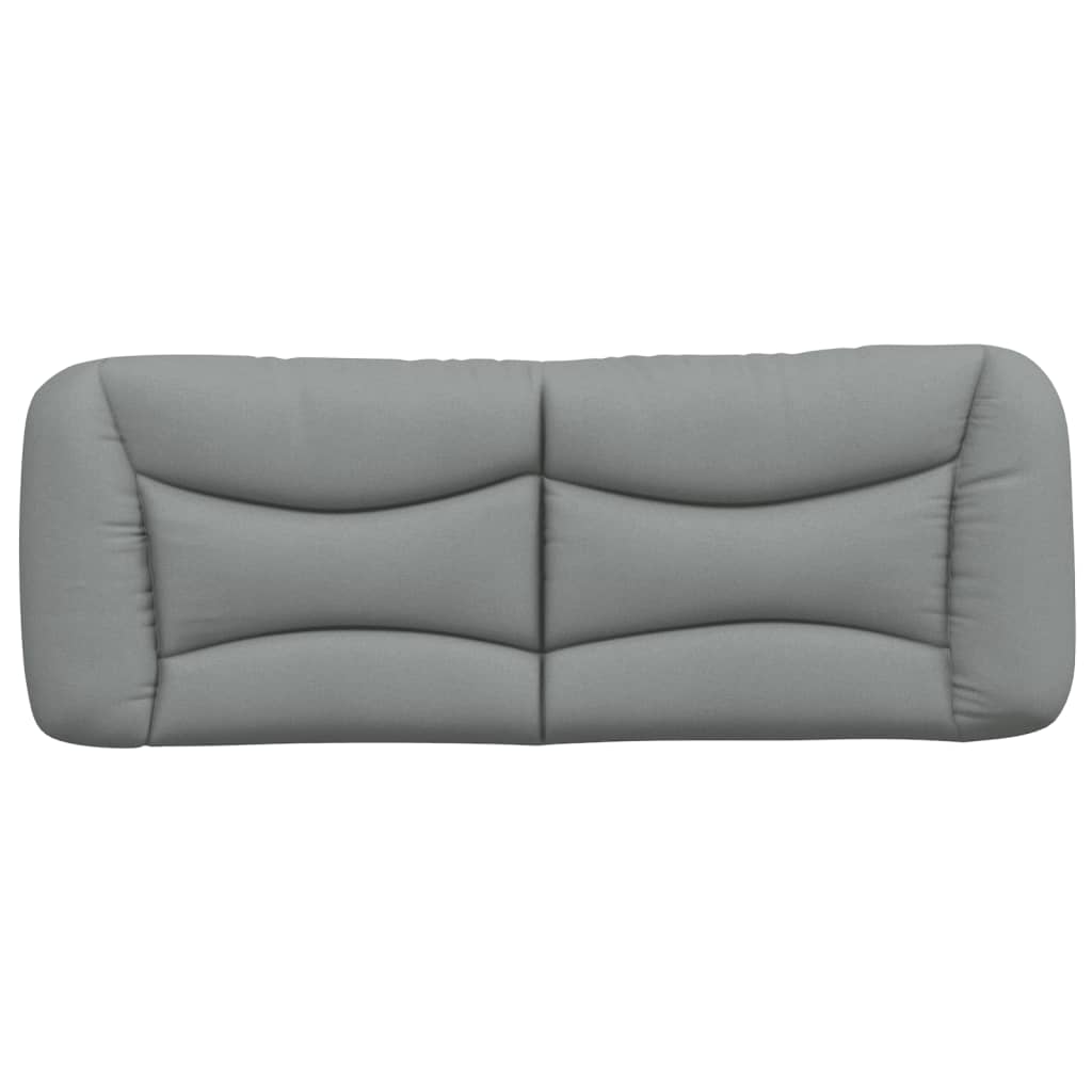 Upholstered grey headboard with curved padded sections