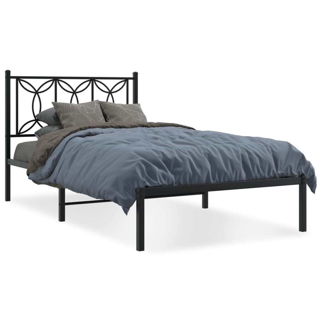 Diagram showing dimensions of a cm wide black metal bed frame with ornate headboard