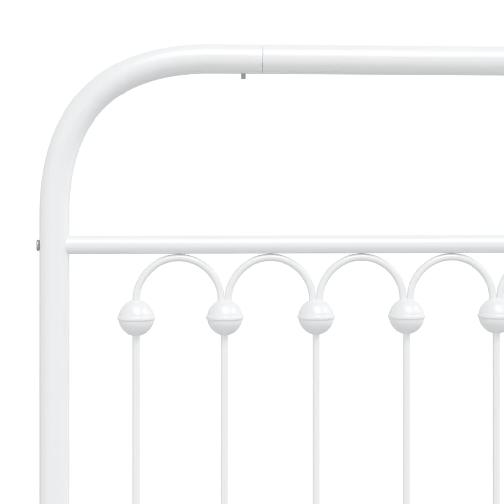White metal twin bed frame with arched headboard and slatted base
